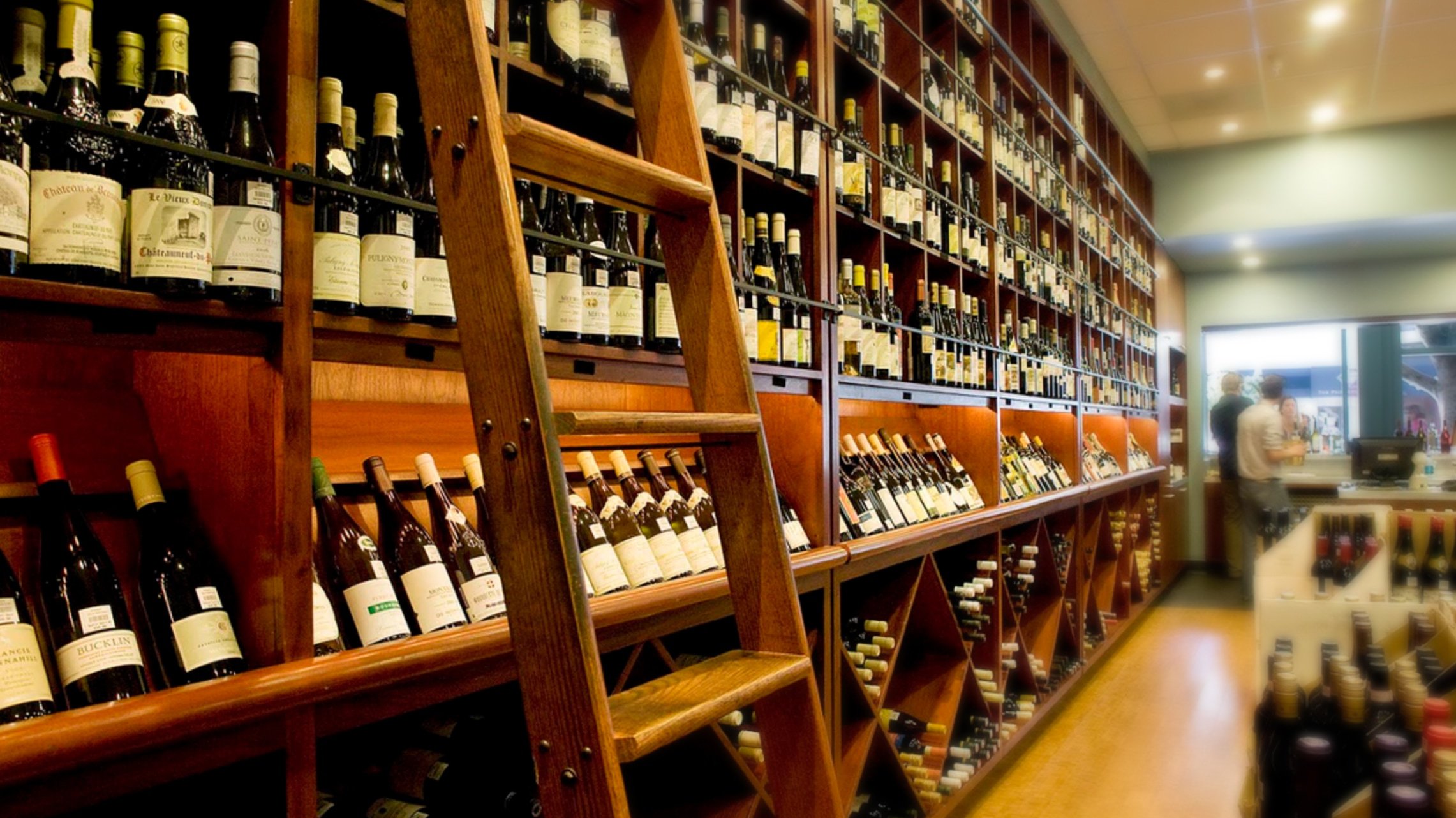 picture of the shelves of wine in Arlequin